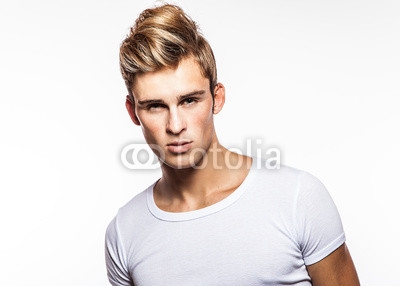 Elegant_young_handsome_man._Studio_fashion_portrait..jpg